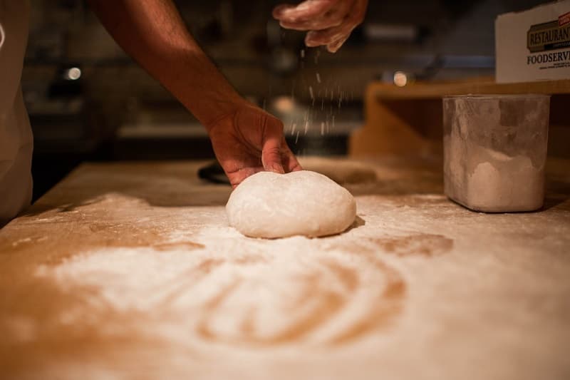 dough being made in flour